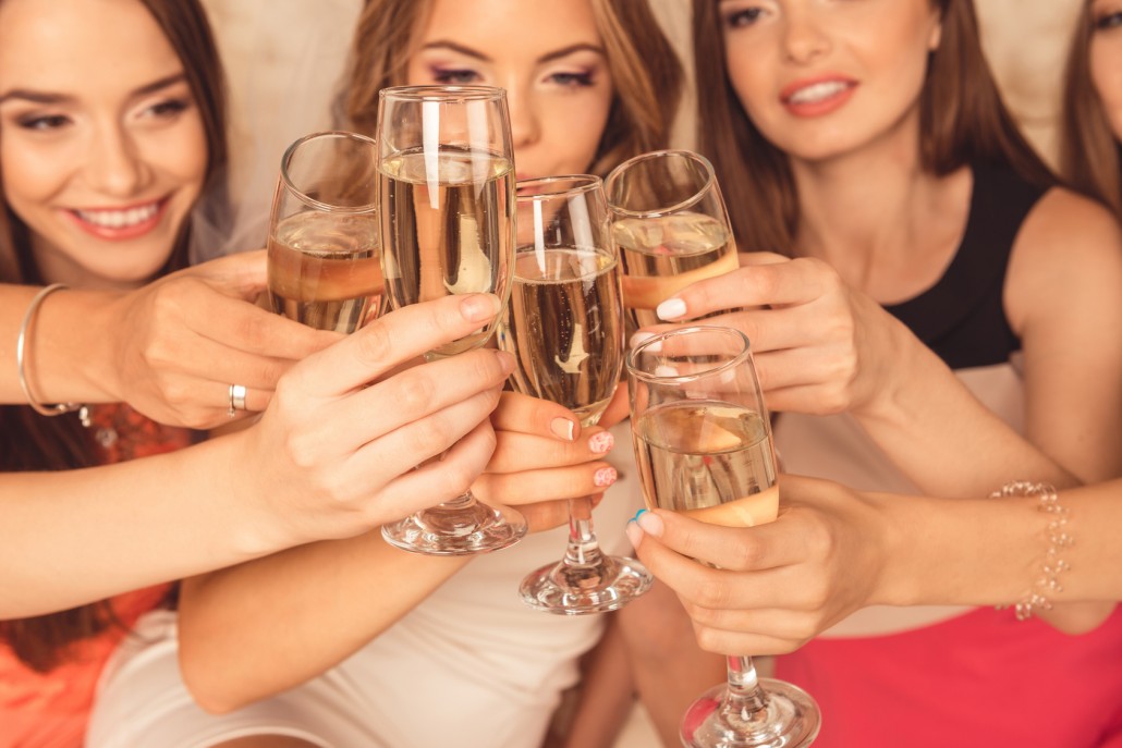 Close up photo of girls celebrating a bachelorette party and cli